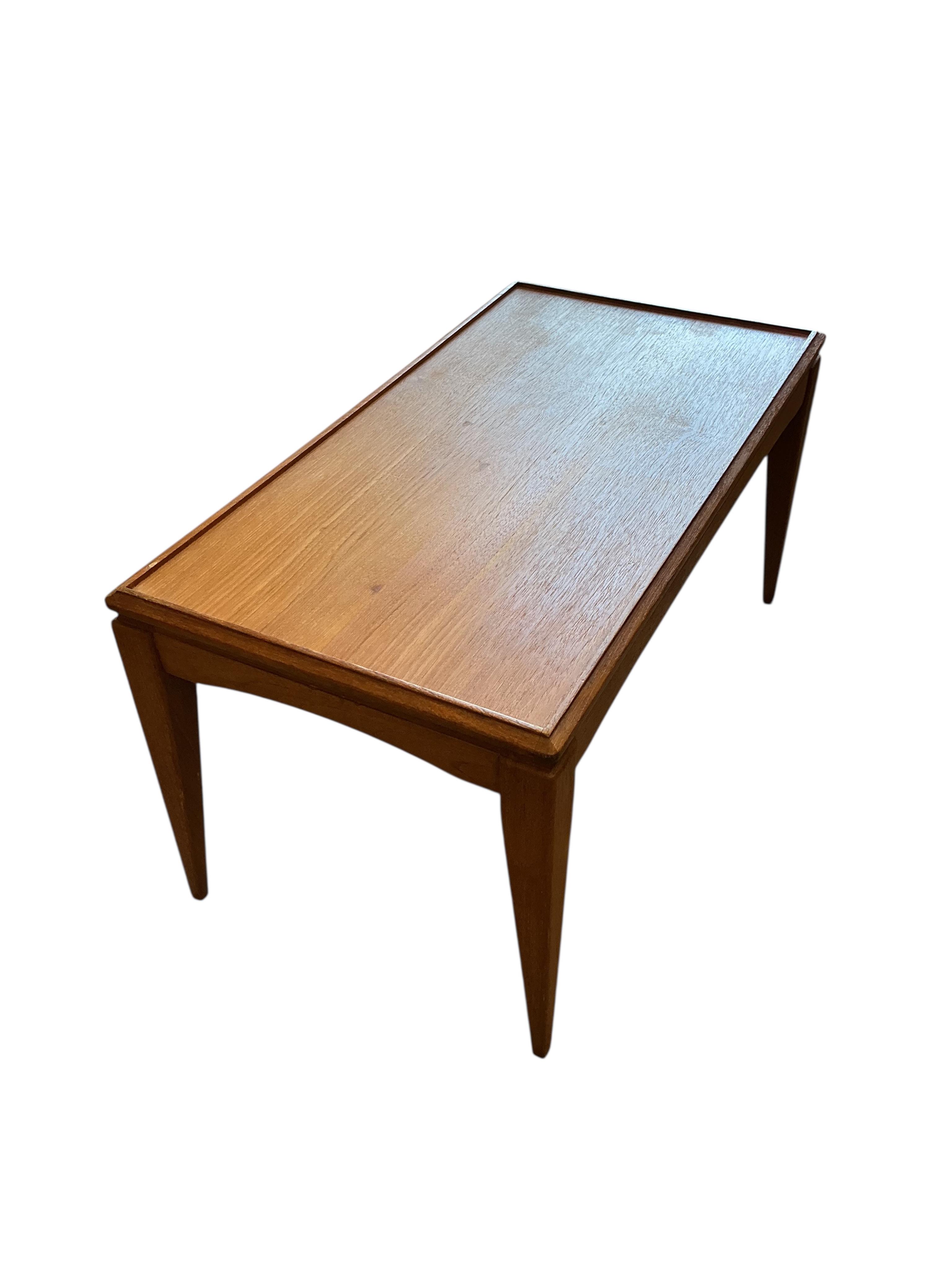 A mid century Gordon Russell teak coffee table, width 76cm, depth 41cm, height 39cm